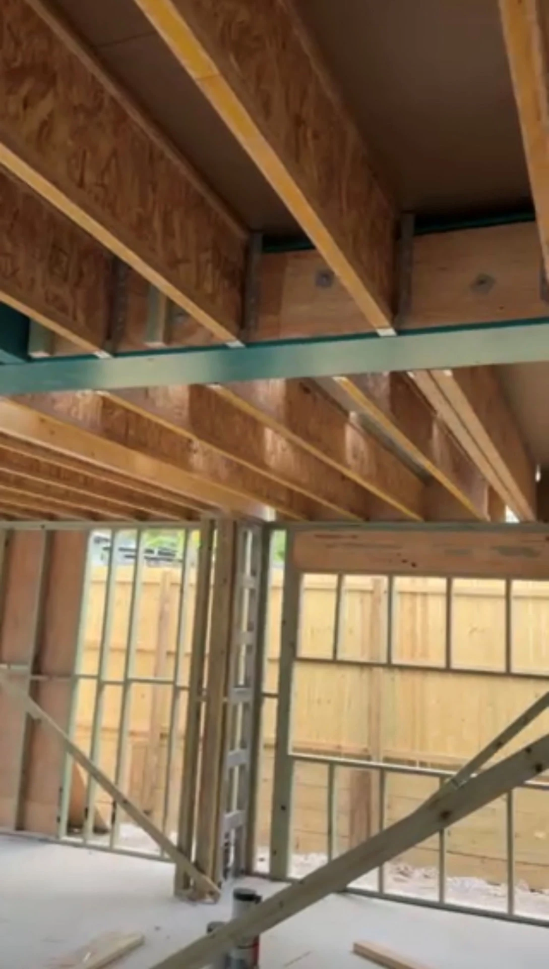 Timber and steel framing with first floor joists in place at the Annie St custom home build in Brisbane